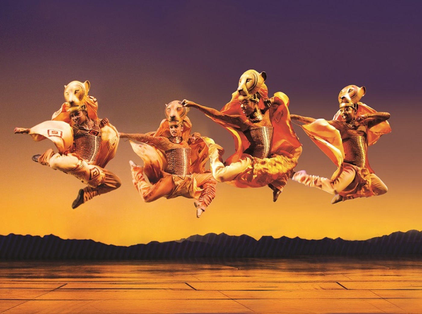 Actors dancing at The Lion King at the Lyceum Theatre