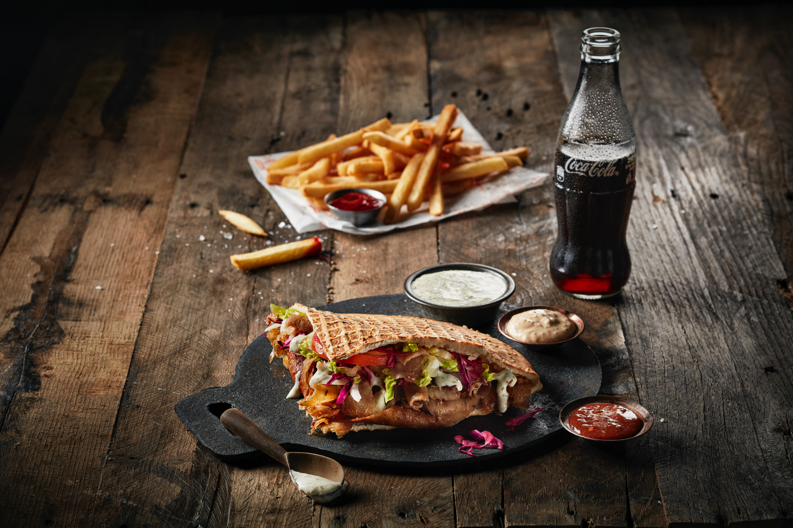 German Doner Kebab London serves gourmet kebabs with crispy fries and fresh sauces, redefining fast food with premium ingredients.