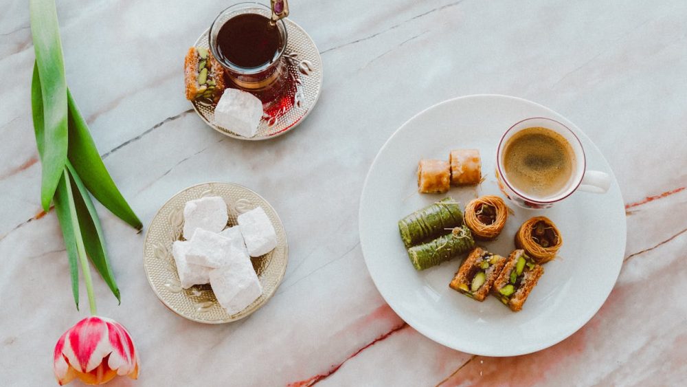 Traditional Iftar Restaurants In London serving Turkish coffee, baklava, and sweet treats for Ramadan celebrations in an elegant setting.