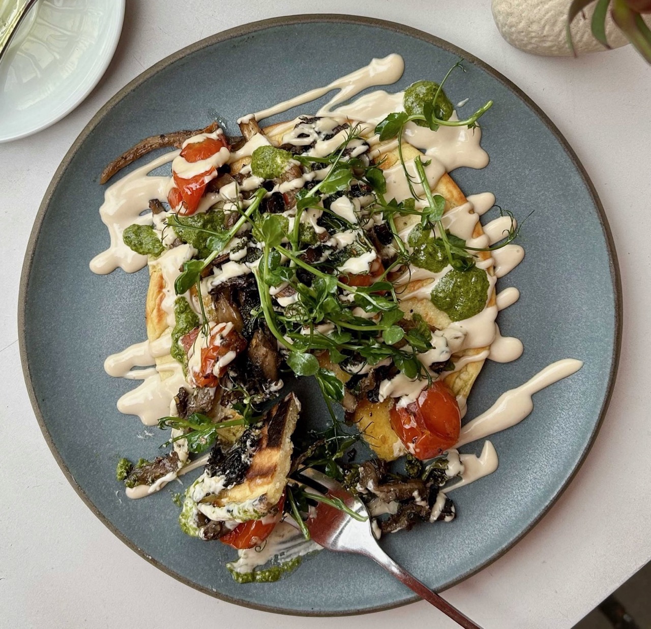 A vibrant dish from Ottolenghi Richmond, showcasing fresh, flavorful ingredients and Middle Eastern-inspired cuisine in London.