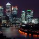 Illuminated skyline of Canary Wharf at night, showcasing London’s financial district and the thriving London startups ecosystem.