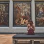 A curated art collection in London featuring contemporary paintings and sculptures displayed in a modern gallery setting