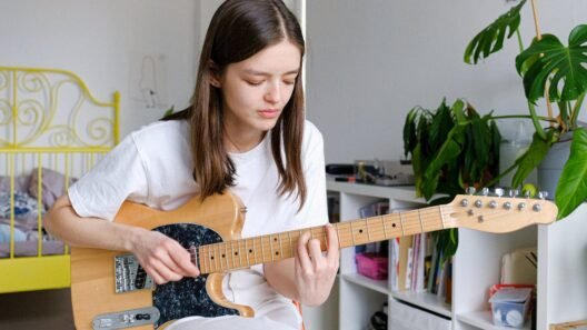 girl playing guitar depicting the unusual hobbies in London
